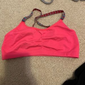 hot pink under armor sports bra
